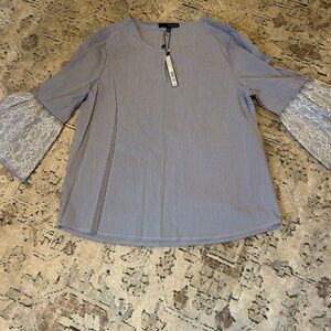 Woman’s new top size large